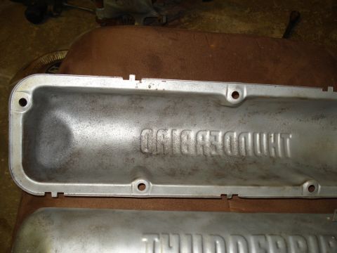 1967 Ford F-250 - Two aluminum engine valve covers are shown, one with embossed text 'THUNDERBIRD'.