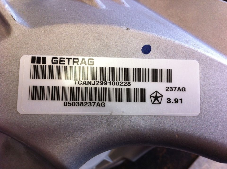 Getrag transmission part with barcode, Chrysler pentastar logo, and '237AG 3.91' text