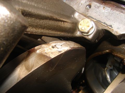 1973 Ford Ranchero - Internal engine components, likely a crankshaft and connecting rod, showing signs of use.