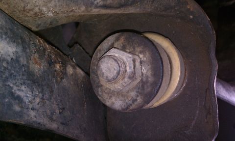 1984 Ford Bronco - Passenger side Radius Arm Bushing, it looks amiss.