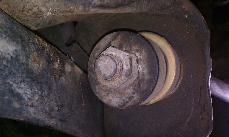 Passenger side Radius Arm Bushing, it looks amiss.