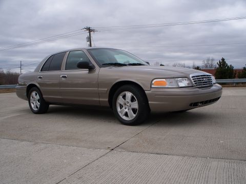 2007 Ford Crown Victoria - This 2007 Ford Crown Victoria is shown from a three-quarter front angle on a cloudy day.