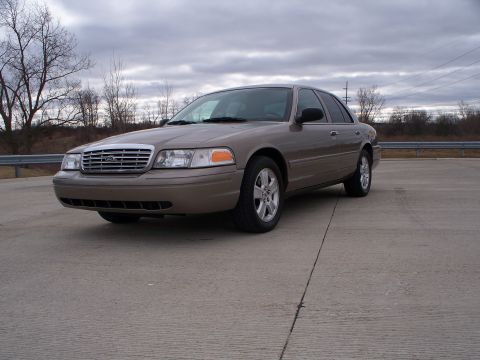 2007 Ford Crown Victoria - A 2007 Ford Crown Victoria is shown from the front-three-quarter angle on a cloudy day.