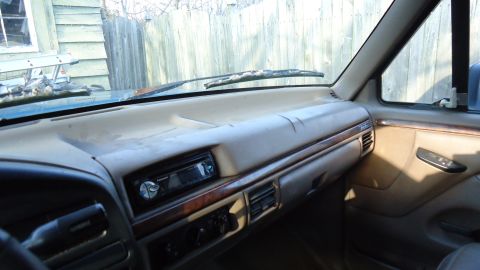 1996 Ford Bronco - Interior view of a truck's dashboard, showing the center console and passenger side.