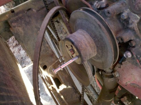 1979 Ford Bronco - Engine pulley and belt system detail, showing wear and rust.