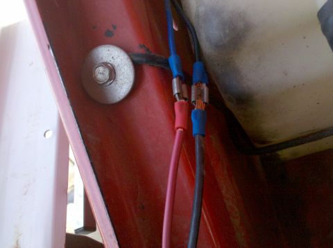 1979 Ford Bronco - Close-up view of electrical wiring connections, likely part of an aftermarket installation.