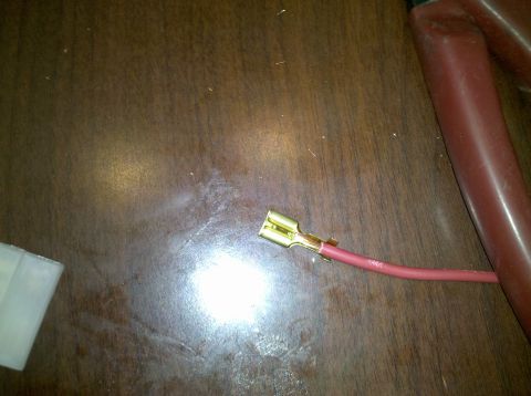 1979 Ford Bronco - Close-up of an electrical wire with a spade connector, likely a replacement part.