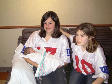 1978 Ford Bronco - Two girls and a baby are dressed in New York Giants jerseys.