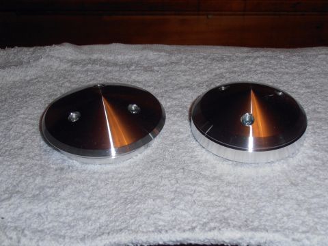 1990 Ford Bronco - Two polished metal pulleys are displayed on a white towel, with no visible vehicle context.