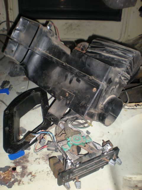 1978 Ford Bronco - A disassembled heater core and control panel assembly, showing the internal components and wiring.