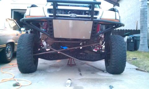 1992 Ford Ranger - This heavily modified truck features an aftermarket bumper and suspension system, lifted for off-road use.