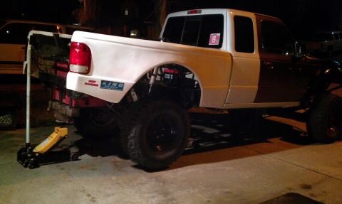 1992 Ford Ranger - This modified Ford Ranger pickup truck features a lifted suspension and custom body panels, with a visible "Supermotors.net" watermark.