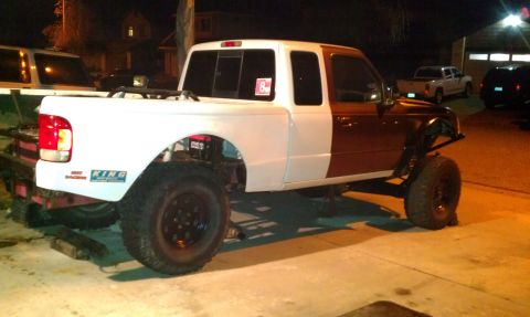 1992 Ford Ranger - This modified pickup truck has a two-tone paint scheme and appears to be undergoing some custom work.