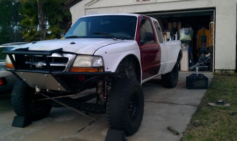 1992 Ford Ranger - Modified 1992 Ford Ranger pickup truck with custom front bumper and lifted suspension.