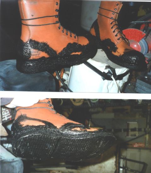 1980 Ford Bronco - A pair of tan work boots are shown with a black rubberized coating applied to the soles and lower sides.