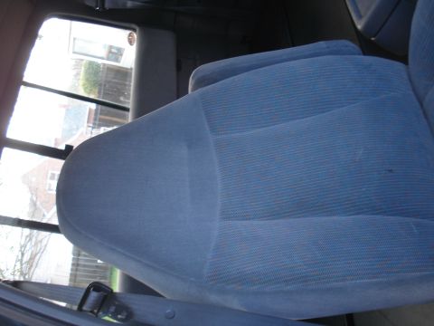 1994 Ford F-250 - Interior view of a vehicle, focusing on the seat and window.