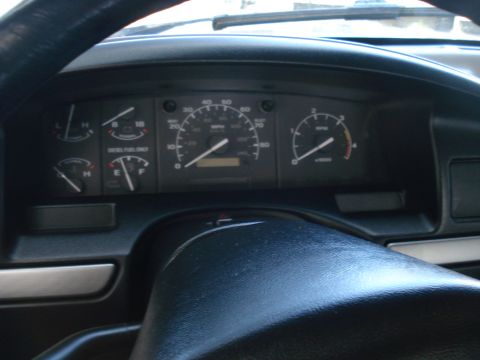 1994 Ford F-250 - Dashboard view of a 1994 Ford F-250, showing the instrument cluster and steering wheel.