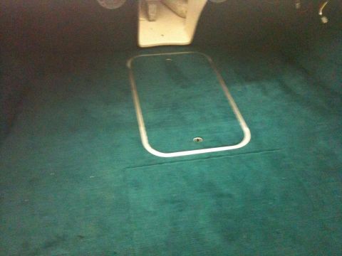 1978 Chevrolet Camaro - Teal carpet covers the floor of this boat's interior, a recessed hatch.