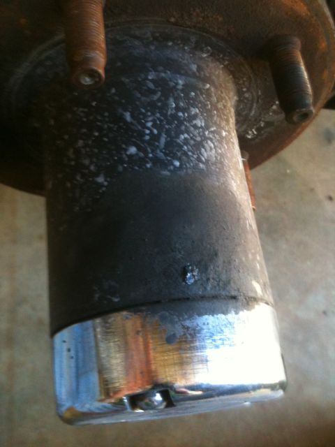 1995 Ford Bronco - That little place where the grease is leaking. That is where you want to use a pic to get the lock ring out. by pushing in on the lock ring…