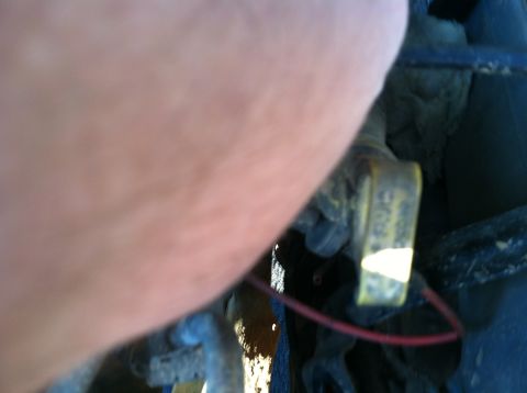 1997 Ford F-250 - A yellow tag with text is visible on a component, with a red wire nearby.