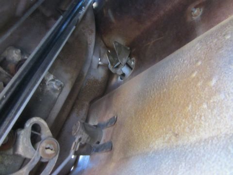 1964 Ford Ranchero - Close-up view of the interior door lock mechanism and handle assembly on a 1964 Ford Ranchero.