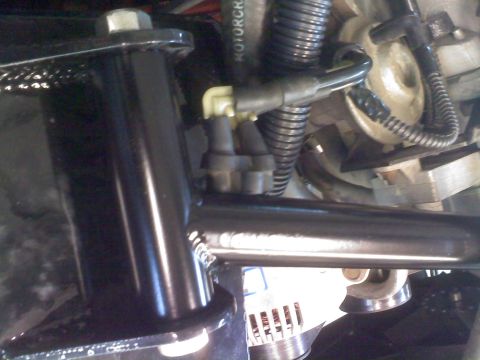 1996 Ford Bronco - Close-up view of engine and suspension parts, with visible text from Supermotors.net.