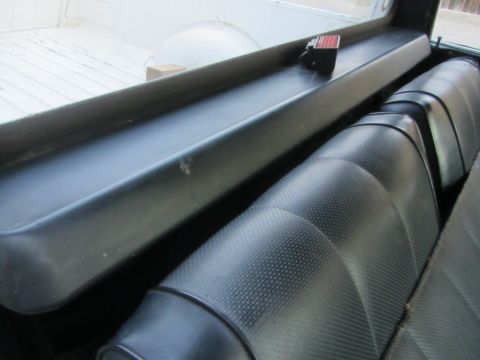 1964 Ford Ranchero - View of the interior seats and the bed of a pickup truck.