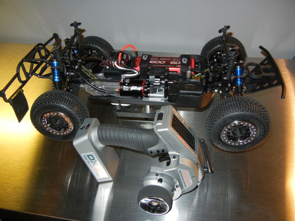 RC short course truck chassis and remote control transmitter