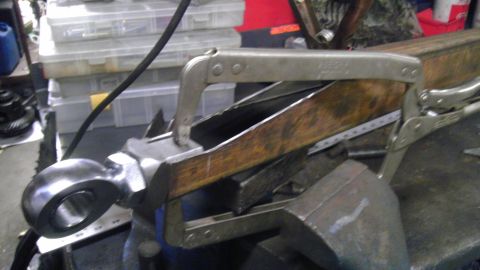 1987 Ford Ranger - Metal fabrication work in progress, showing a rod end secured for modification.