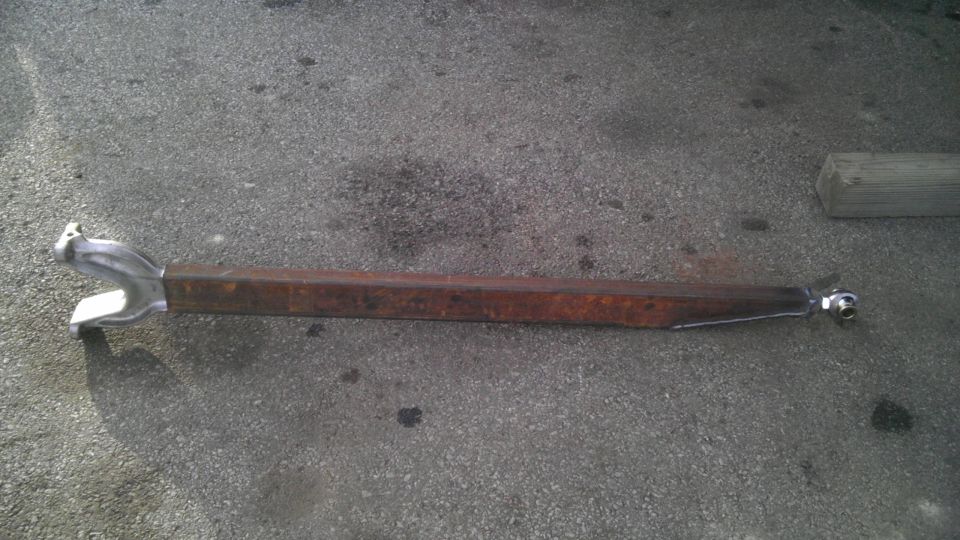Suspension control arm with a U-shaped end and a threaded rod end