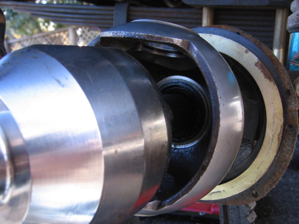 Close-up of a disassembled CV joint with metal components