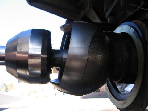 1993 Toyota 4Runner - A close-up view of a vehicle's CV joint, showing mechanical components.
