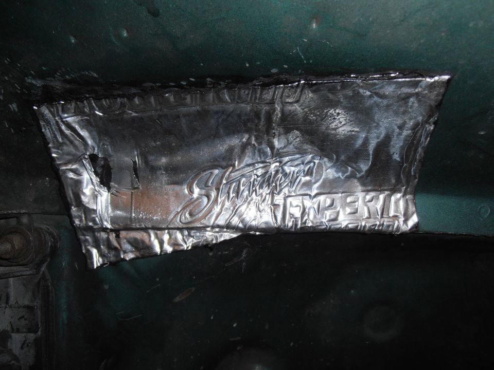 Embossed sound deadening material with text 'Stroker' and 'Temper' visible