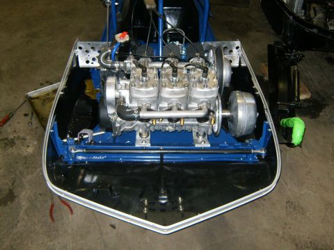 2000 Ford E350 - Close-up view of a snowmobile's internal engine components, showing a multi-cylinder setup.