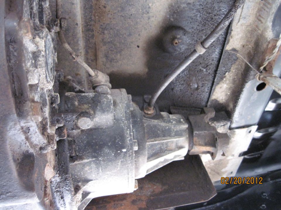 close-up of vehicle's transfer case and driveshaft connection