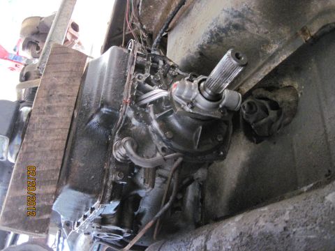 1979 Ford Bronco - A close-up view of a vehicle's transmission and driveshaft, dated 02/20/2012.