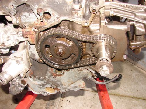 1973 Ford Ranchero - Close-up view of an engine's timing chain and gears, showing mechanical components.