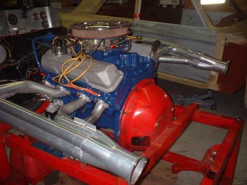 1969 Mercury Cyclone - Engine on a stand with custom exhaust headers and air cleaner assembly.