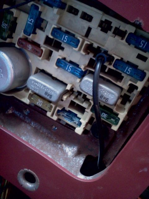 1989 Ford Bronco - This image shows a close-up view of a vehicle's fuse box, detailing various fuses and their ratings.