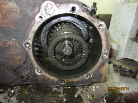1979 Ford Bronco - Gears and shafts visible inside a disassembled NP205 transfer case, dated 02/25/2012.