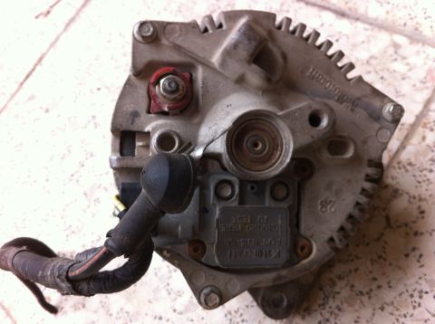 1998 Ford Crown Victoria - Motorcraft alternator, possibly for a 1998-1999 Ford vehicle, with visible part information.