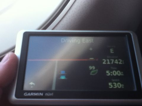 2006 Ford E350 - A Garmin nuvi GPS device displays navigation information, including direction, distance, time, and speed.