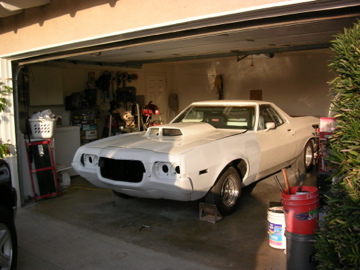 1972 Ford Ranchero - This 1972 Ford Ranchero is parked in a garage, possibly undergoing restoration or modification.