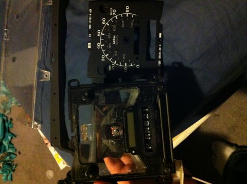 1992 Ford F-150 - Next comes peeling off the Gauge face. It will be a bit resistant so take your time. The PSOM has a couple of pegs on the front. Those just…