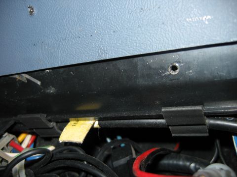 1992 Ford Bronco - Close-up view of the wiring and interior paneling of a 1992 Ford Bronco.