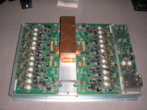 1978 Ford F-150 - A complex electronic circuit board a prominent copper heat sink and many visible transistors and capacitors.