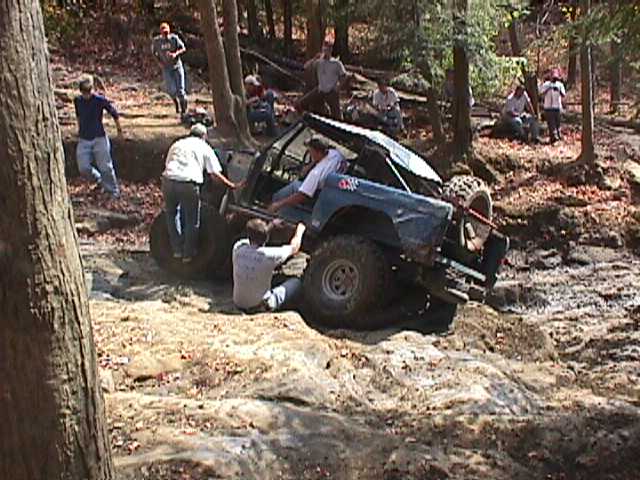 1996 Ford Bronco on a rocky trail, 3q-front view