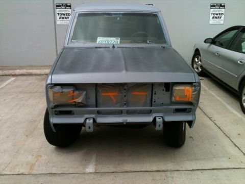 1988 Ford Bronco II - This SUV is in primer and appears to be undergoing some work, with protective tape on the front end.
