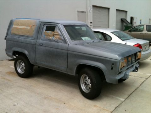 1988 Ford Bronco II - This 1988 Ford Bronco II is prepped for paint, with its windows taped off for protection.