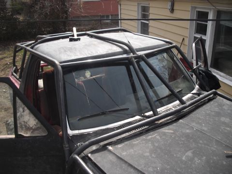 1986 Ford Bronco - This vehicle has been heavily modified with a custom external roll cage structure.
